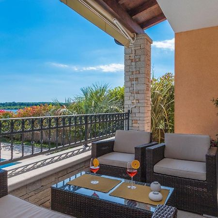 Ferienhaus In Pomer Mit Privatem Beheizten Pool Und Meerblick Екстер'єр фото